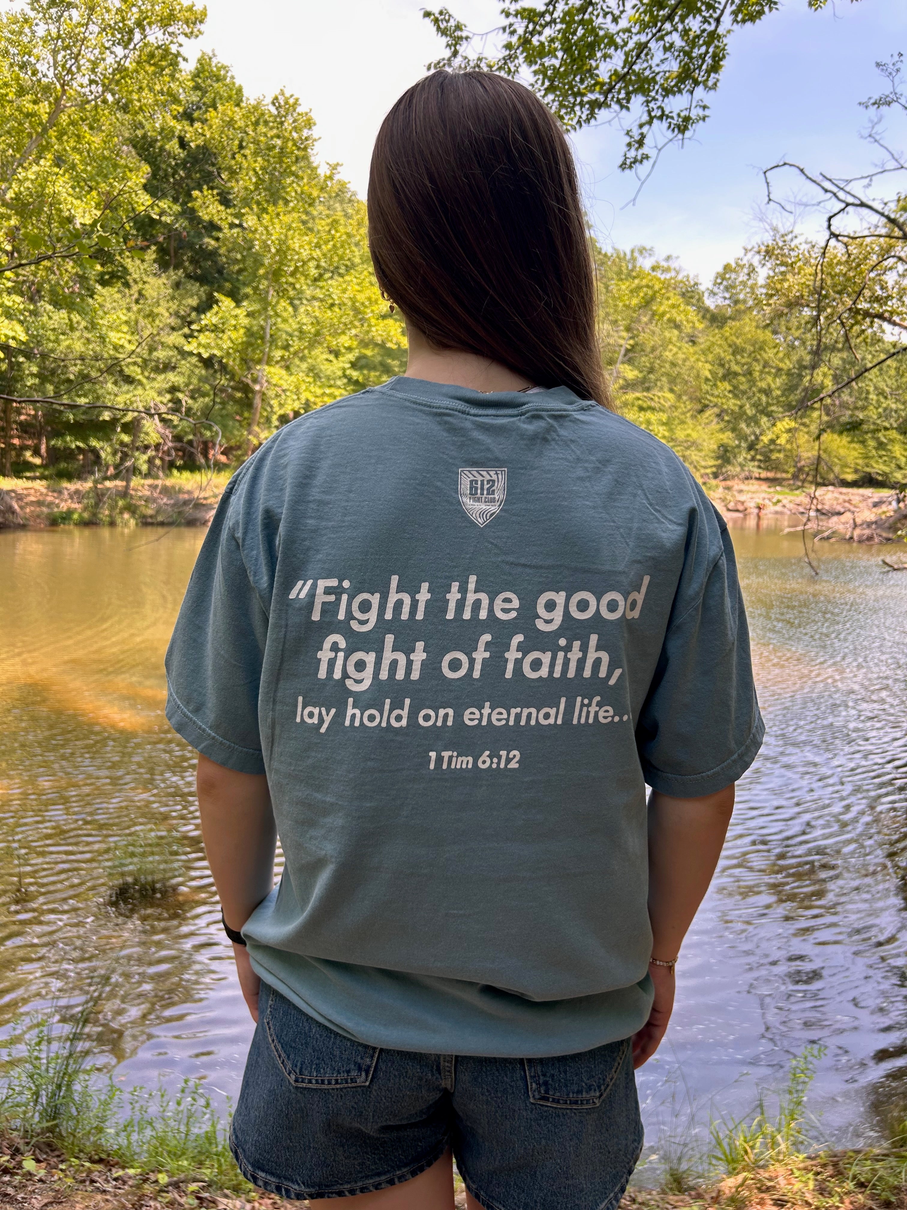 1 Timothy 6:12 Cotton Tee - Ice Blue (White Print)