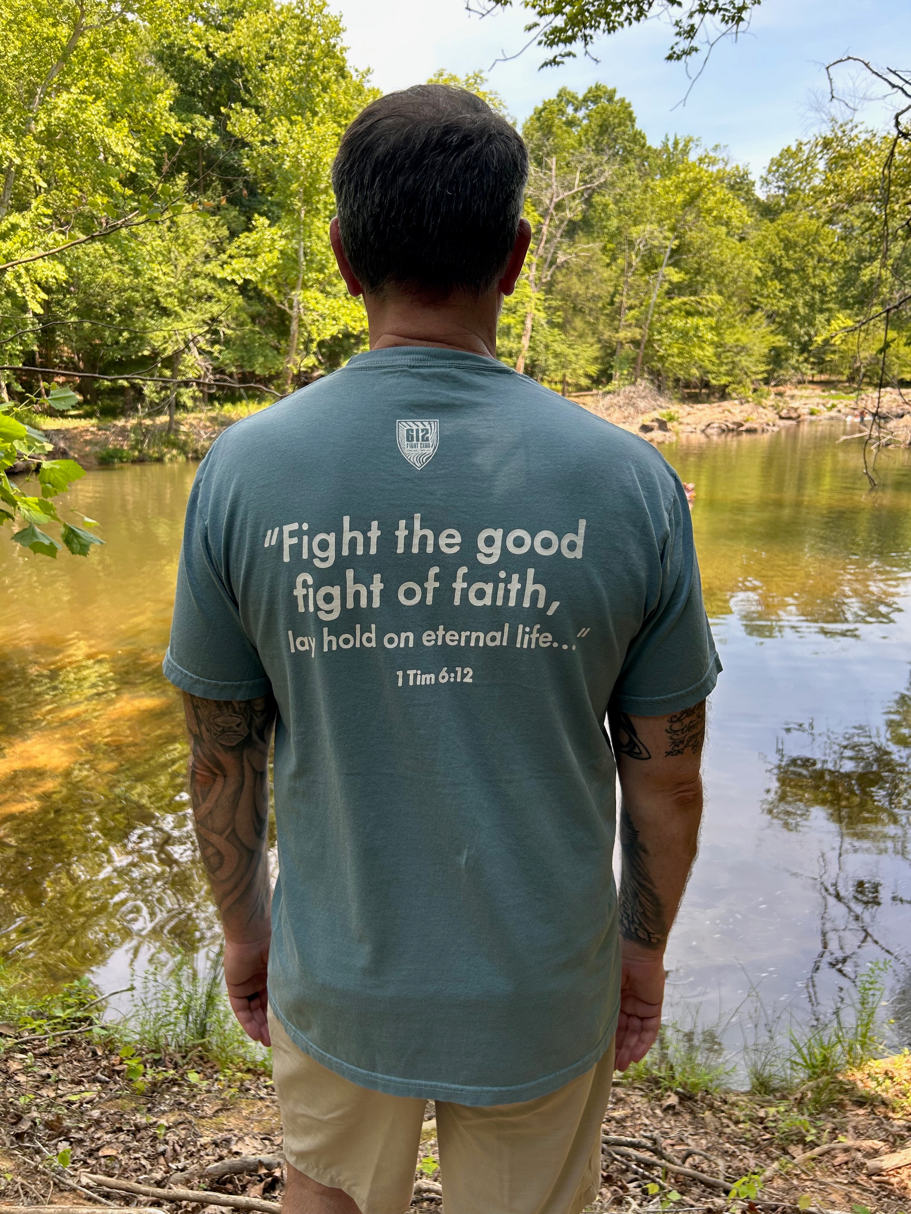 1 Timothy 6:12 Cotton Tee - Ice Blue (White Print)